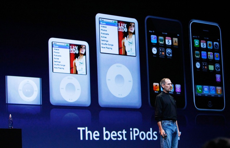 SAN FRANCISCO - SEPTEMBER 05:  Apple CEO Steve Jobs speaks in front of a display of the new iPod products during an Apple Special event September 5, 2007 in San Francisco, California. Jobs announced a new generation of iPods as well as a partnership with Starbucks to access music being played at Starbucks coffee shops with the new iPod Touch.  (Photo by Justin Sullivan/Getty Images)