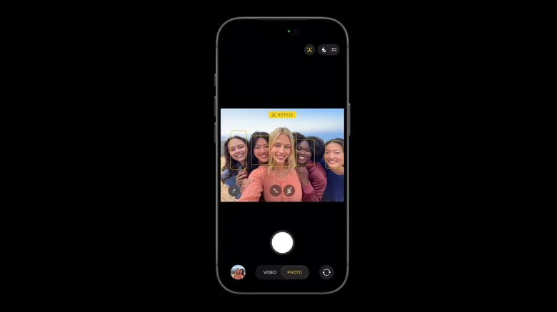 A screenshot of the iOS Camera app being used to take a group selfie.