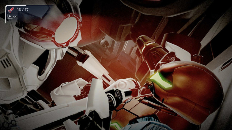 Screenshot from Metroid Dread. Close-up view of Samus in a red suit on the lower right grappling with a white battle robot in the upper left.