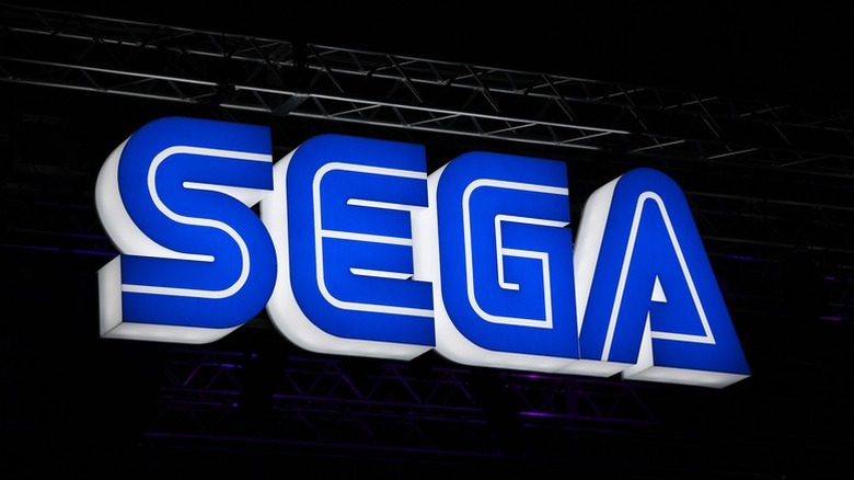 A Sega sign in blue and white at a trade show